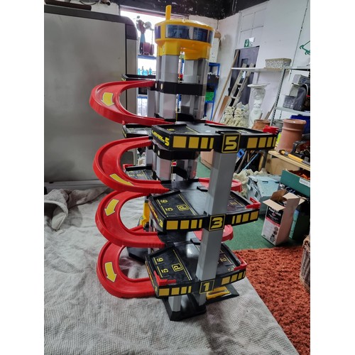 55 - Large children's toy parking station, 6x floors in good condition. Height of 87cm x width 63cm x dep... 