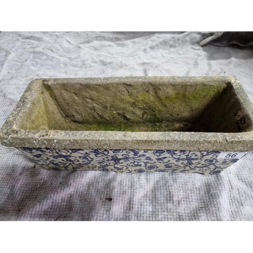 56 - Antique stoneware planter with a glazed blue and white floral design in good condition. Height of 14... 