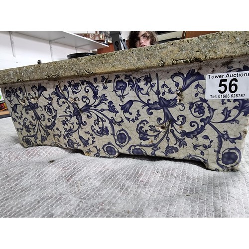 56 - Antique stoneware planter with a glazed blue and white floral design in good condition. Height of 14... 