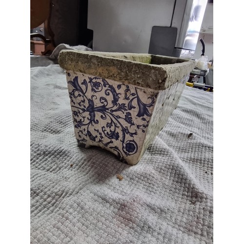 56 - Antique stoneware planter with a glazed blue and white floral design in good condition. Height of 14... 