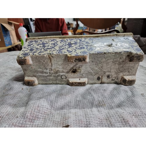 56 - Antique stoneware planter with a glazed blue and white floral design in good condition. Height of 14... 