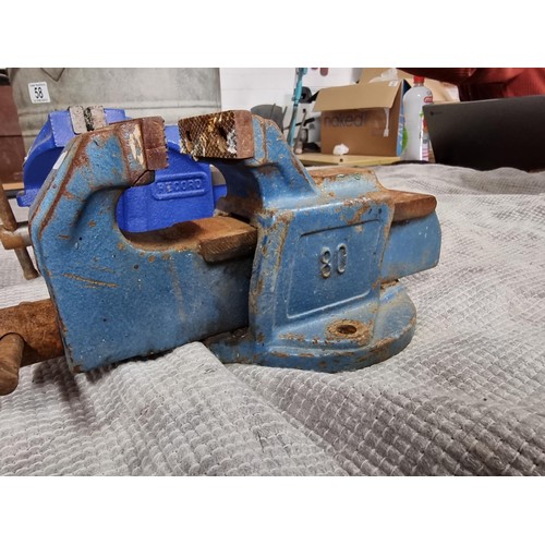 58 - 2x bench vices inc 1x by Record in excellent condition along with a galvanised mop bucket etc. bucke... 