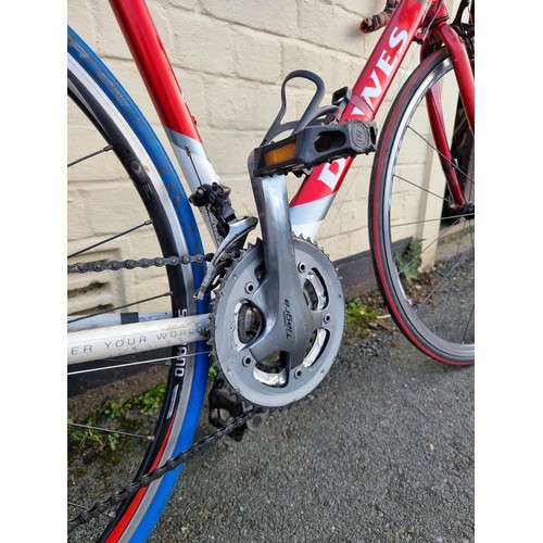 104 - Good quality Dawes Giro 300 adults road racing bike in red with a light weight aluminium frame wih 2... 