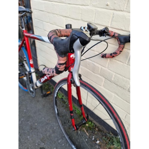 104 - Good quality Dawes Giro 300 adults road racing bike in red with a light weight aluminium frame wih 2... 