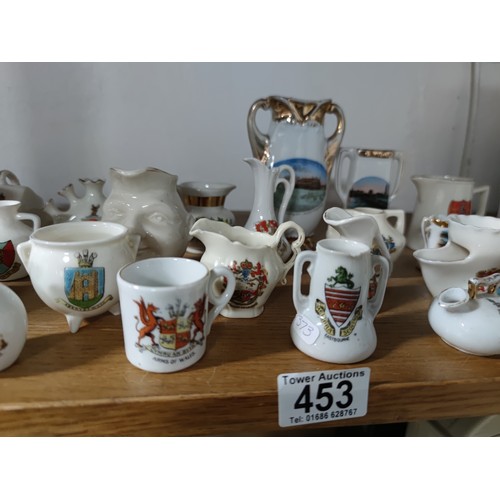 453 - A collection of 33 collectable crestware pieces including a model of Mary Queen of Scots  chair, vas... 