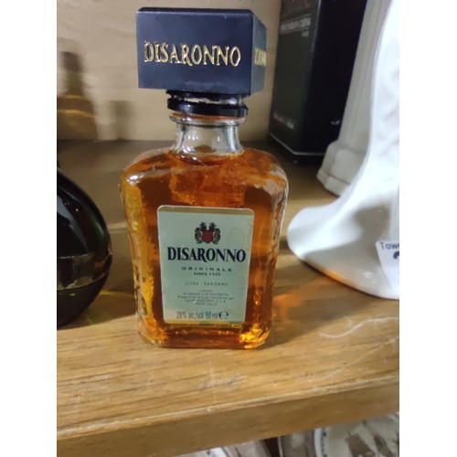 454 - A quantity of 30 alcoholic miniatures including Taylors Port, Disaronno, Bacardi, Grand Marnier, Spr... 