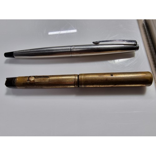 333 - 2x vintage fountain pens inc a Watermans brass fountain pen with a 14k gold nib along with a Parker ... 