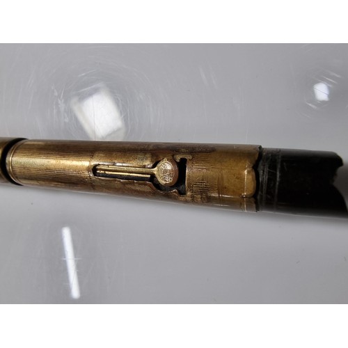 333 - 2x vintage fountain pens inc a Watermans brass fountain pen with a 14k gold nib along with a Parker ... 