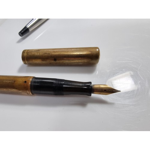 333 - 2x vintage fountain pens inc a Watermans brass fountain pen with a 14k gold nib along with a Parker ... 