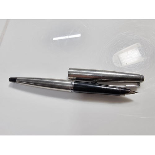 333 - 2x vintage fountain pens inc a Watermans brass fountain pen with a 14k gold nib along with a Parker ... 