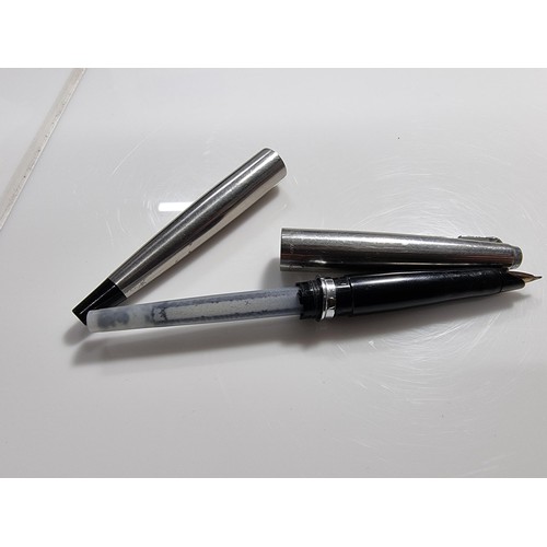 333 - 2x vintage fountain pens inc a Watermans brass fountain pen with a 14k gold nib along with a Parker ... 
