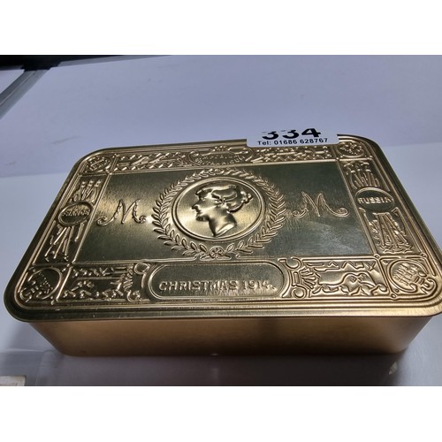 334 - Reproduction WW1 brass Christmas tin full of collectables and coins