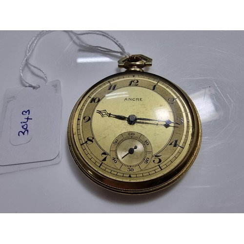 337 - Vintage brass cased pocket watch by Ancre with an attractive engraved design to the back in good cle... 