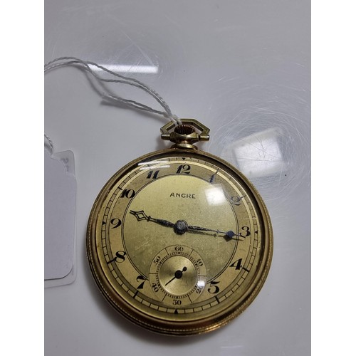 337 - Vintage brass cased pocket watch by Ancre with an attractive engraved design to the back in good cle... 