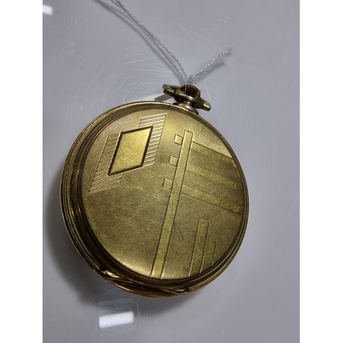 337 - Vintage brass cased pocket watch by Ancre with an attractive engraved design to the back in good cle... 