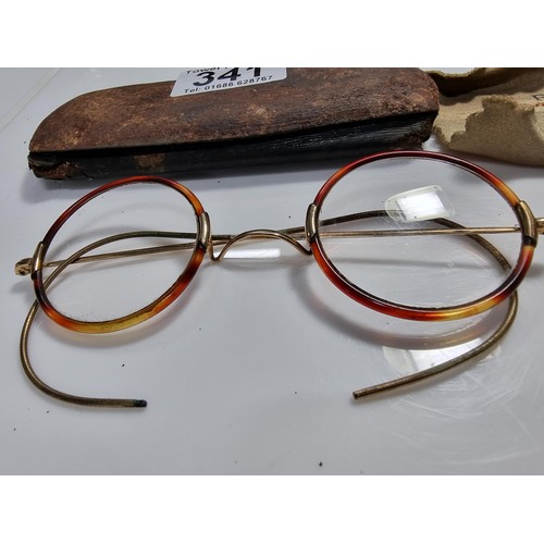 341 - Antique pair of spectacles with attractive tortoise shell rims and with a 12k roll gold frame 1/10 m... 
