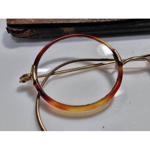 341 - Antique pair of spectacles with attractive tortoise shell rims and with a 12k roll gold frame 1/10 m... 