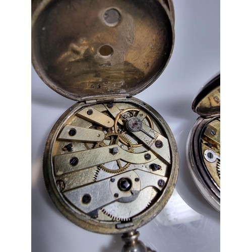 342 - 2x silver fob watches, the cases and dials are in good order, 1x is marked 800 silver and the other ... 