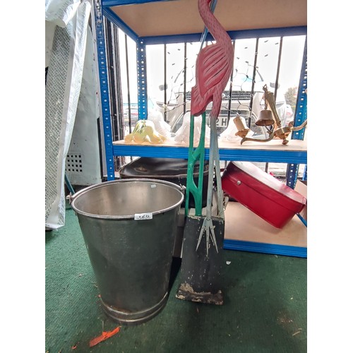 128 - A tall galvanized milk bucket and a wooden fair trade flamingo. Flamingo 103cm tall