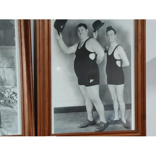 157 - A pair of framed and glazed Laurel and Hardy black and white photos, both in excellent condition. He... 