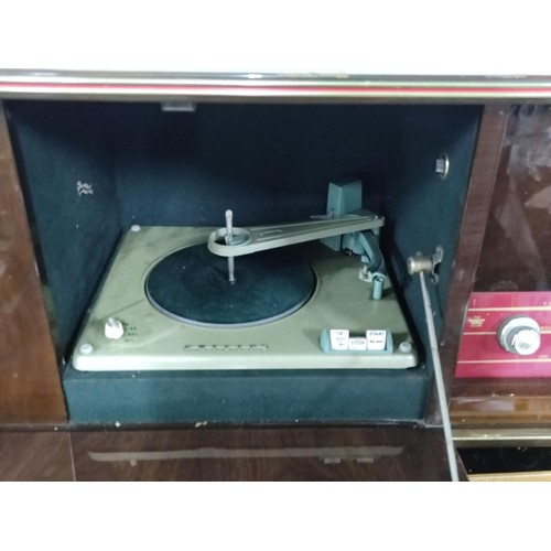 162 - A collection of vintage audio equipment including a stella radio record player with a philips record... 