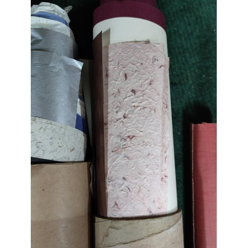 163 - 5 rolls containing a large quantity of book binding and craft paper.