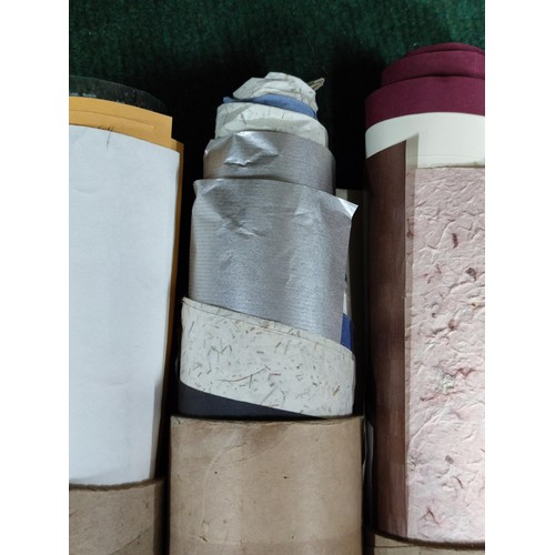 163 - 5 rolls containing a large quantity of book binding and craft paper.