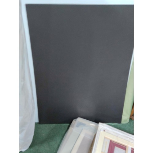 165 - A large quantity of artists mounts and frames in 5 bags. Largest measures 115cm high and a width of ... 