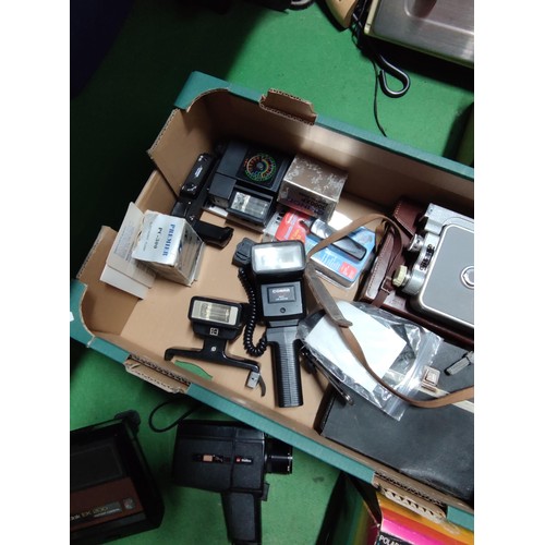 172 - A collection of camera and flashes including a boxed polaroid 340, a polaroid super colour swinger l... 