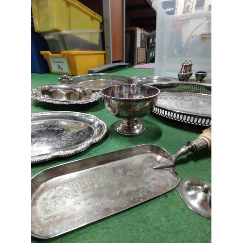 174 - A large quantity of plated ware including tea and coffee pots, butter dish, galleried trays, a condi... 