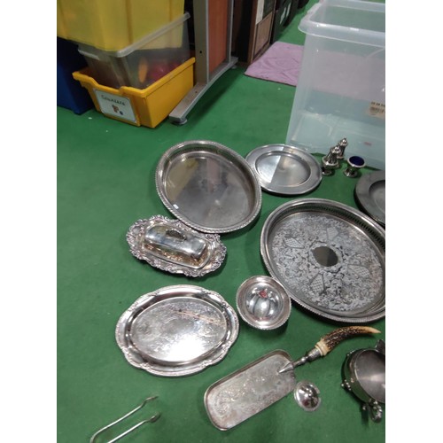 174 - A large quantity of plated ware including tea and coffee pots, butter dish, galleried trays, a condi... 