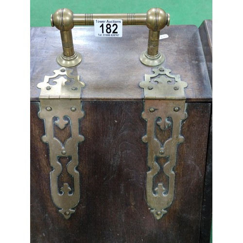 182 - An antique brass bound, solid oak coal scuttle with liner and shovel in excellent condition, studded... 