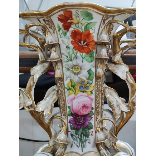 215 - A large impressive old Paris porcelain vase with hand painted floral scenes to the front, with ornat... 