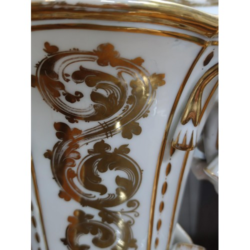 215 - A large impressive old Paris porcelain vase with hand painted floral scenes to the front, with ornat... 