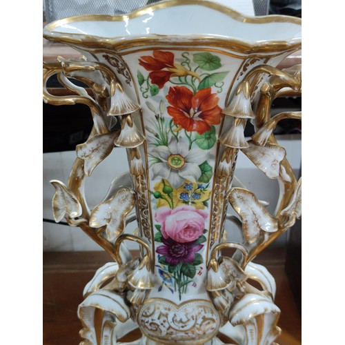 215 - A large impressive old Paris porcelain vase with hand painted floral scenes to the front, with ornat... 