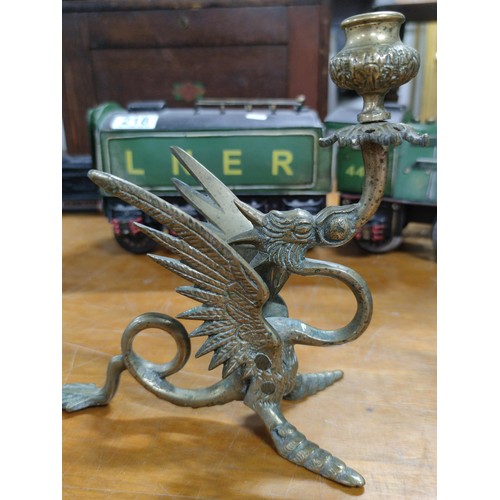 219 - A pair of bronze dragon formed candlesticks, very well detailed in excellent condition.
Height 20cm,... 