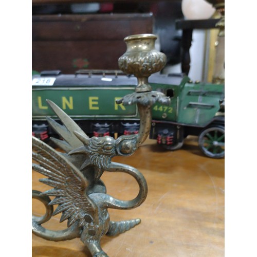 219 - A pair of bronze dragon formed candlesticks, very well detailed in excellent condition.
Height 20cm,... 