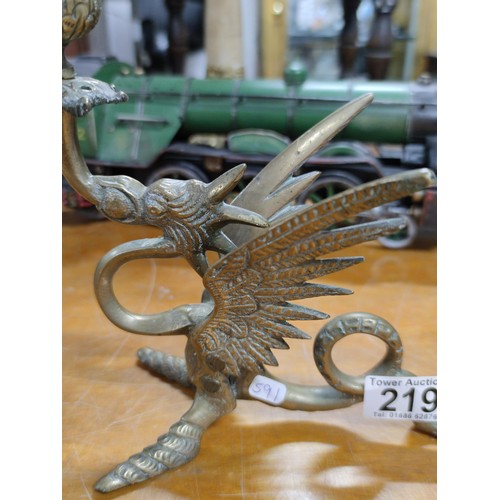 219 - A pair of bronze dragon formed candlesticks, very well detailed in excellent condition.
Height 20cm,... 