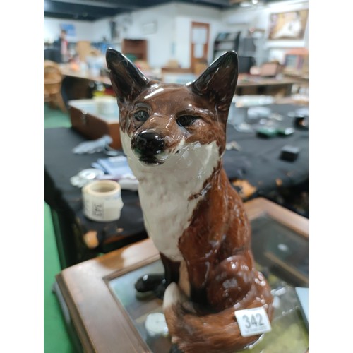 441 - A tall fireside Beswick fox figure number 2348. Old repair to one ear, otherwise in good order.
Heig... 