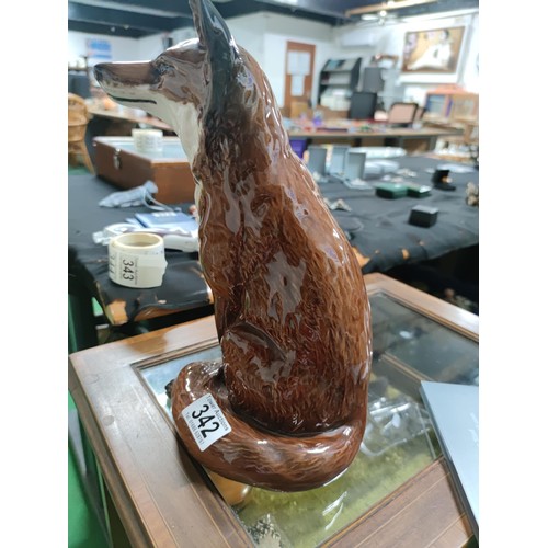 441 - A tall fireside Beswick fox figure number 2348. Old repair to one ear, otherwise in good order.
Heig... 