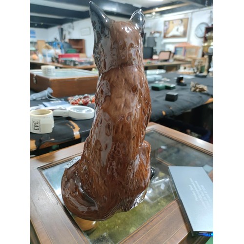 441 - A tall fireside Beswick fox figure number 2348. Old repair to one ear, otherwise in good order.
Heig... 