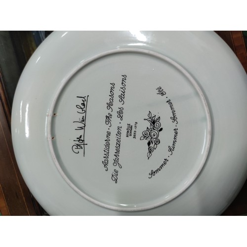 442 - A pair of nymolle Denmark plates. Both decorated by drawings by the artist Glad for Summer and Autum... 