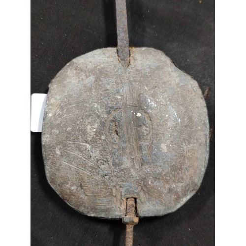 446 - A heavy lead copper covered vintage pendulum, length 20cm, Width 12cm.