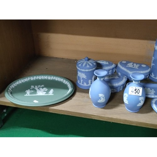 450 - A quantity of blue and white wedgwood including trinket boxes vases plate etc