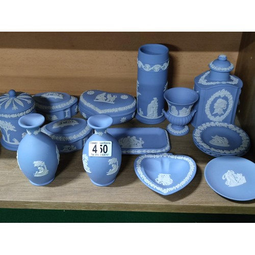 450 - A quantity of blue and white wedgwood including trinket boxes vases plate etc
