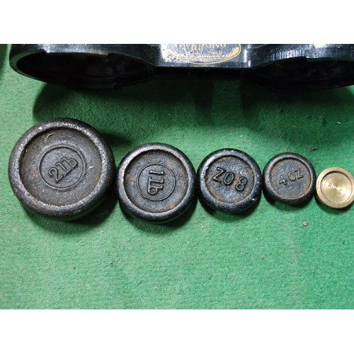 451 - FJ Thornton and co the viking cast iron vintage scales with 5 weights from 2 ounces to 2 pounds.