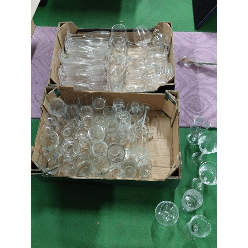 298 - A very large quantity of table glassware including champagne flutes, brandy glasses, sherry glasses,... 