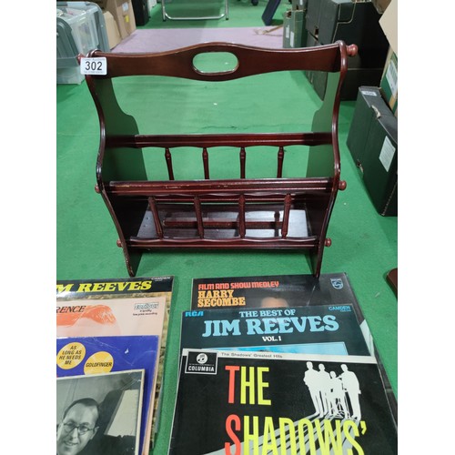 302 - A quantity of 10 LP's including Jim Reeves, Tony Hancock, The Seekers etc. Along with a small barome... 