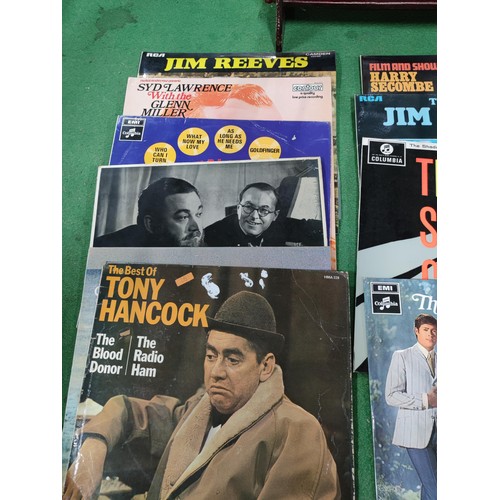 302 - A quantity of 10 LP's including Jim Reeves, Tony Hancock, The Seekers etc. Along with a small barome... 