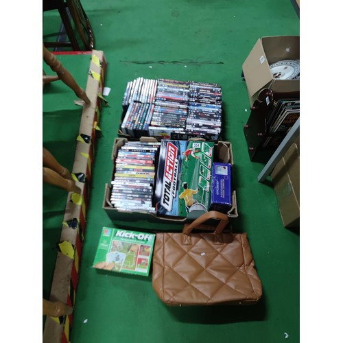 304 - 2 boxes containing a large quantity of DVD's along with 2 football related board games, 5 kingsbury ... 